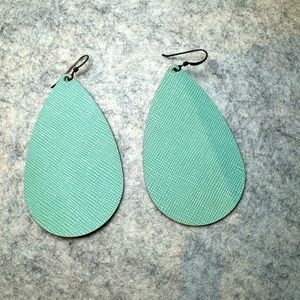 Turquoise leather earrings by Nickel and Suede